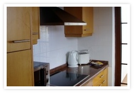 kitchen wish dishwasher and door to utility room